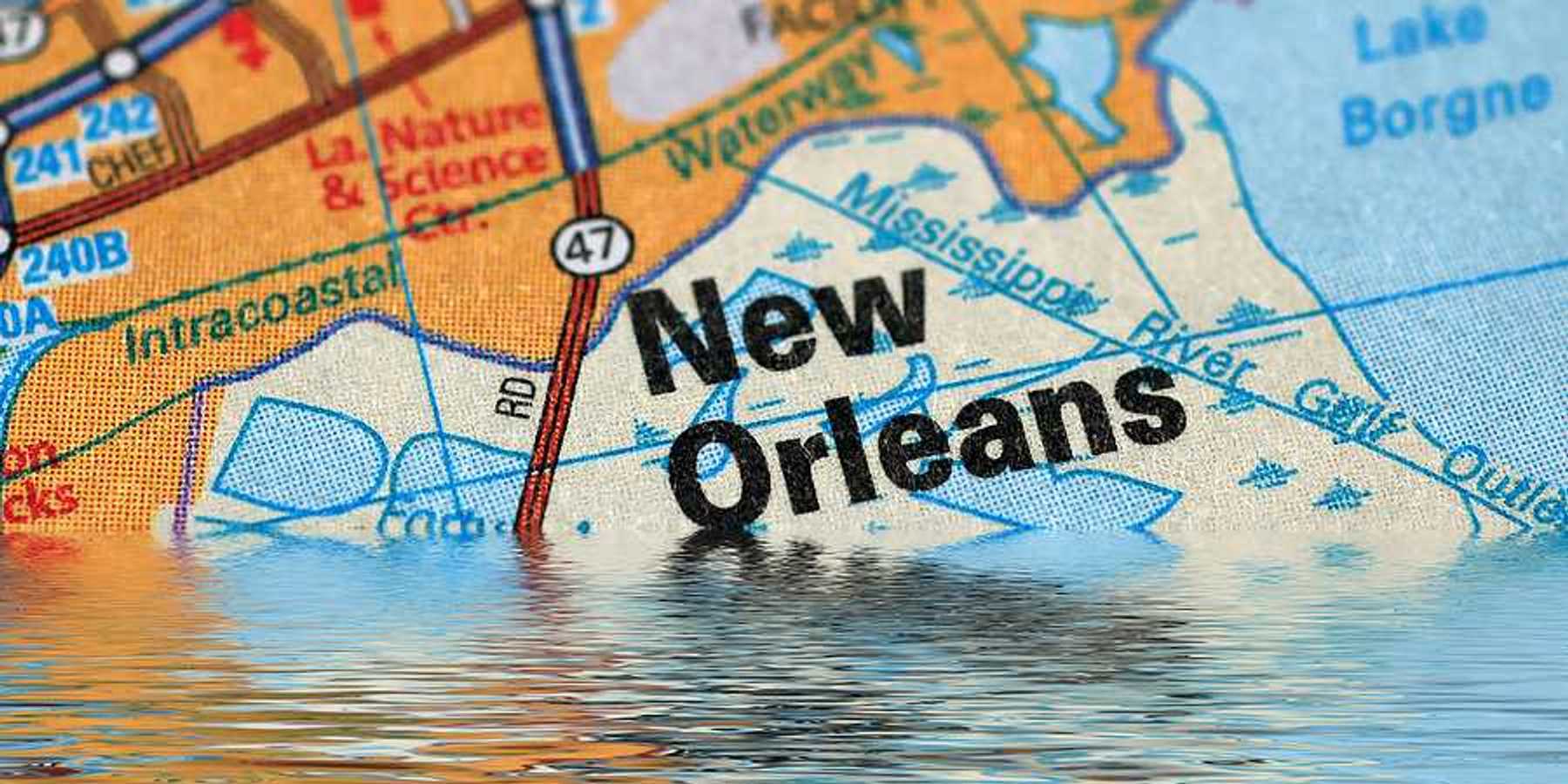 Highway map segment of New Orleans partially submerged in water