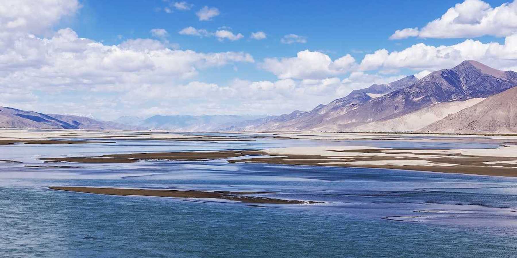 Holy Brahmaputra river, Yarlung Tsangpo, and Tibetan mountain landscape