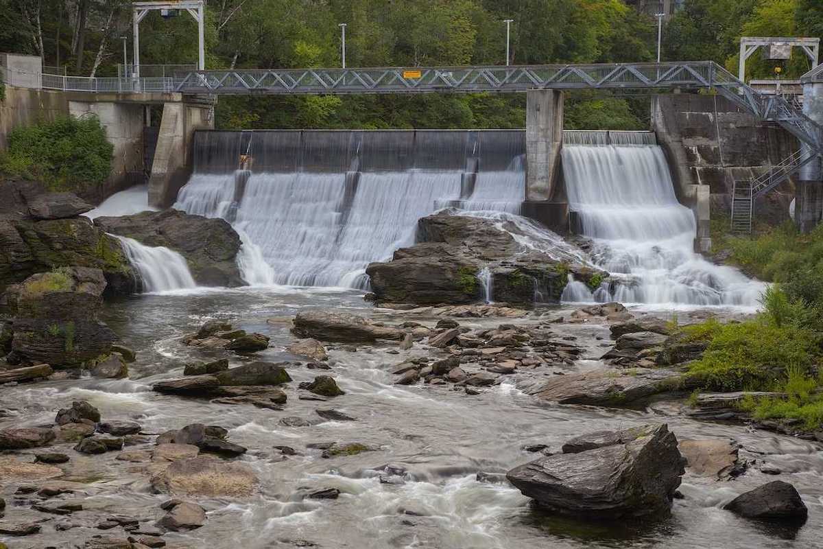 hydroelectric dam on river producing electricity as renewable energy - Sherbrooke, Quebec
