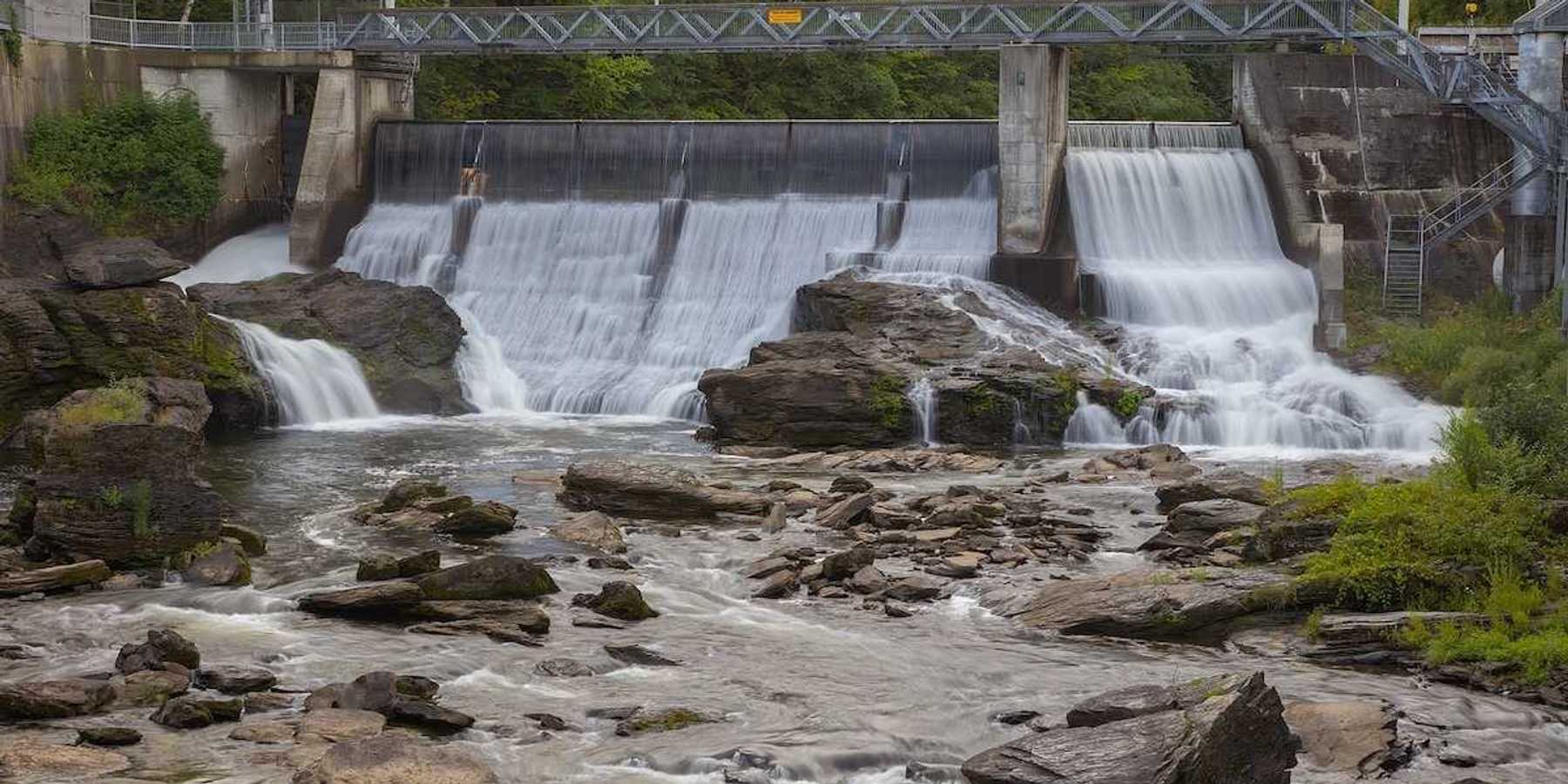 hydroelectric dam on river producing electricity as renewable energy - Sherbrooke, Quebec