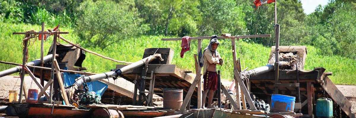 Illegal gold mining operation on the Madre de Dios river in Peru