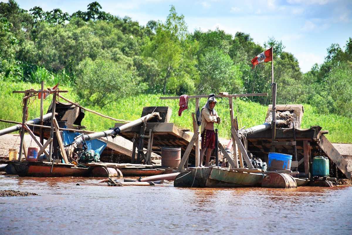 Illegal gold mining operation on the Madre de Dios river in Peru