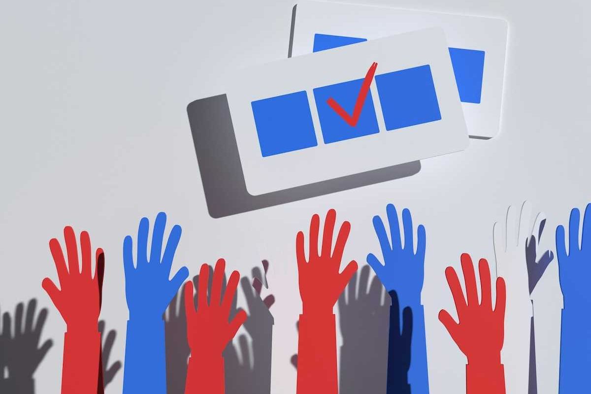 illustration of blue, red, and gray hands raised below a blue checkbox with red checkmark