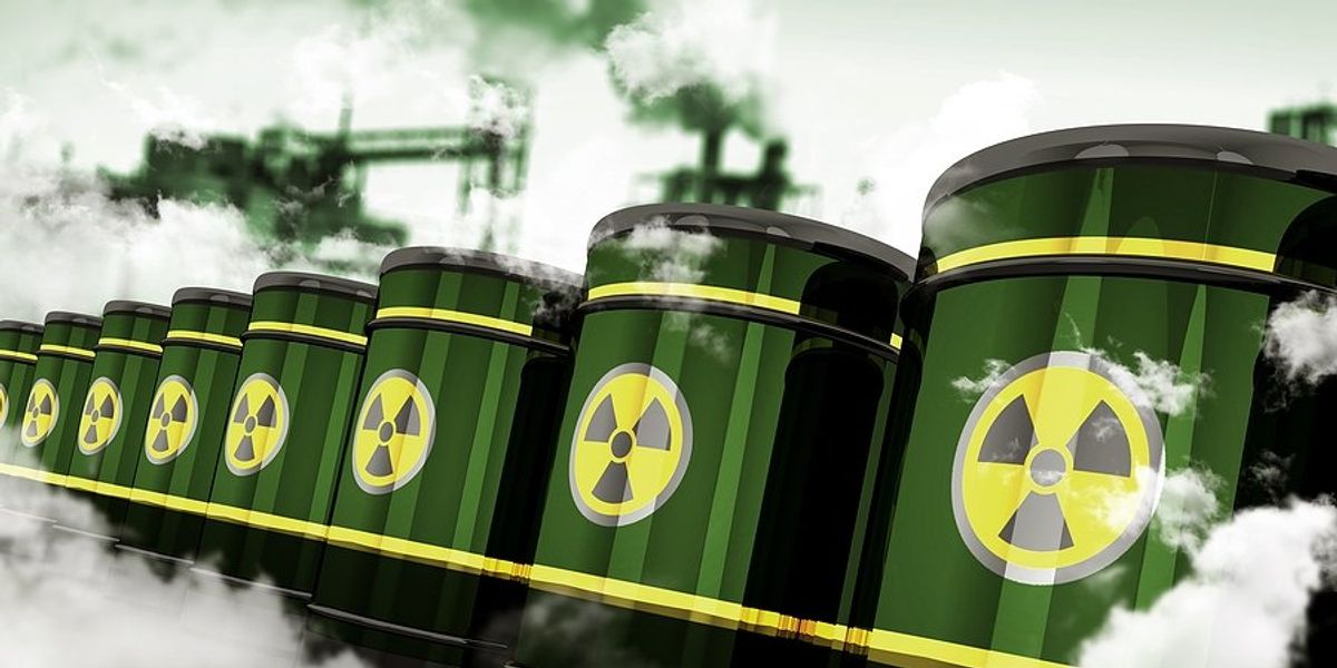 Illustration of green barrels with yellow radioactive notices on them.