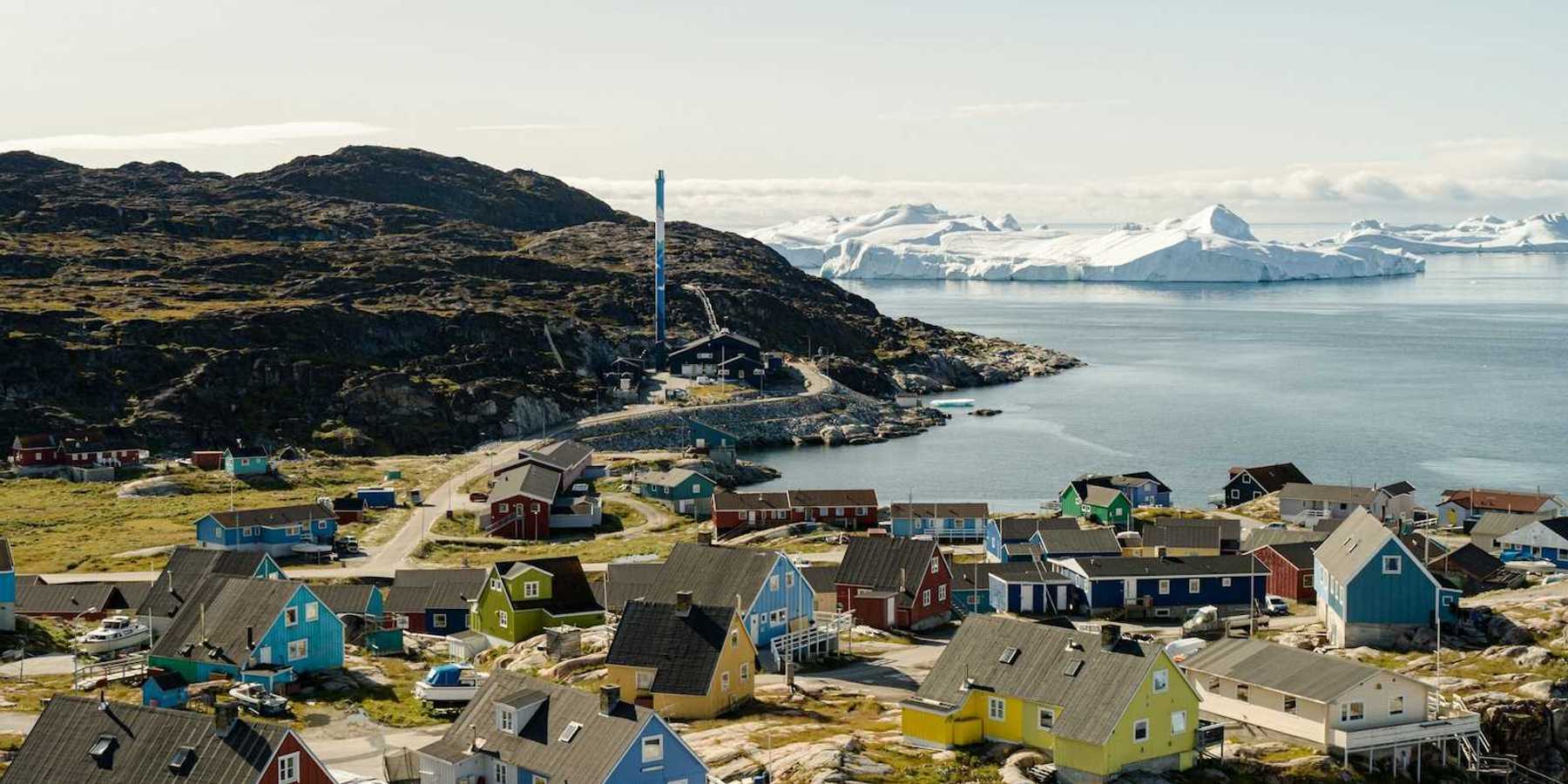 Ilulissat, Greenland - coastal village with icebergs floating in bay