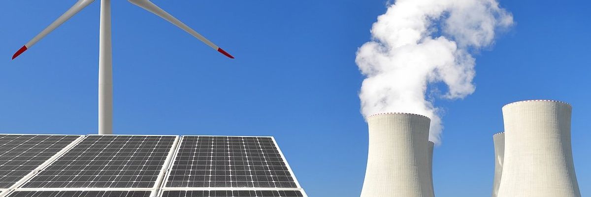 Image of Wind turbines, solar panels, and fossil fuel power plants.