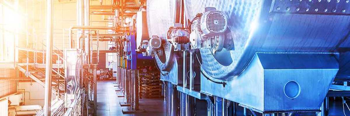 Interior of chemical factory or plant workshop with metal industrial manufacturing production equipment