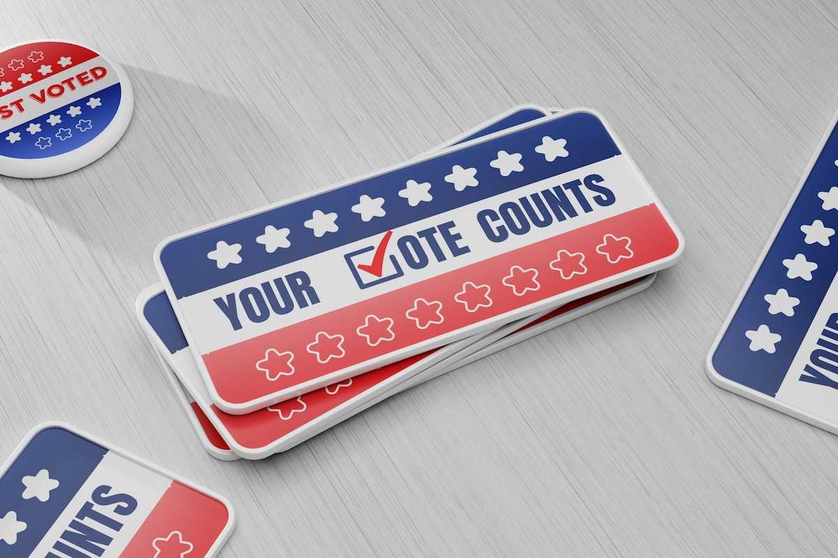 Items meant to encourage people to vote "YOUR √OTE COUNTS"