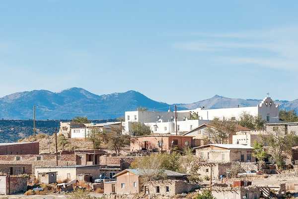 Laguna Pueblo, New Mexico with mountains in background.