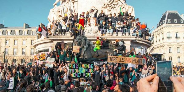 Large crowd gathered at the Place de la République, Paris, France for climate protest