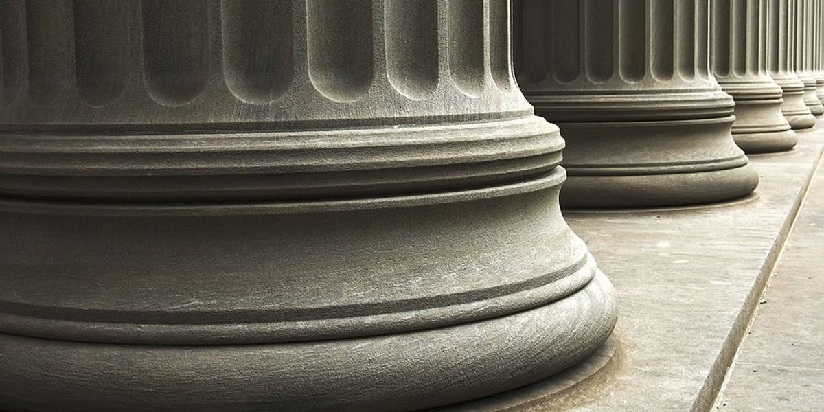 Large gray concrete columns.