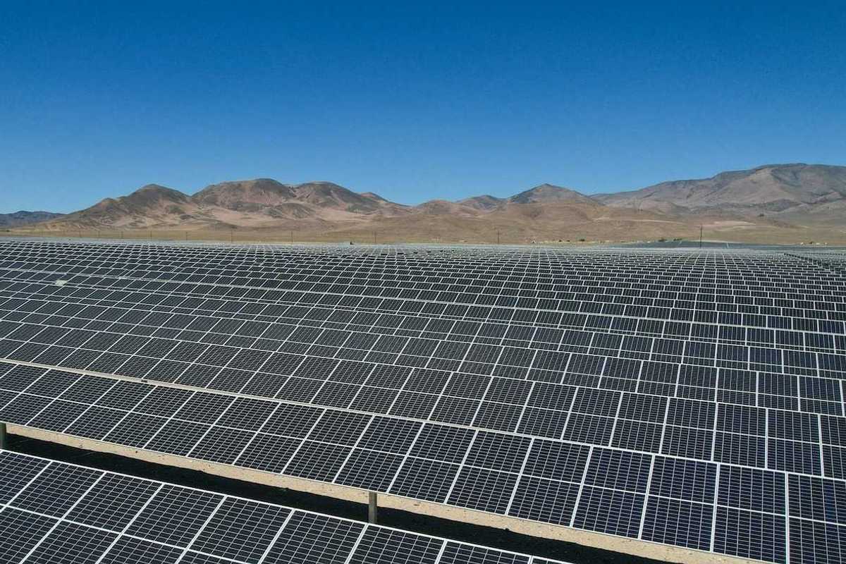 Large solar farm in desert landscape
