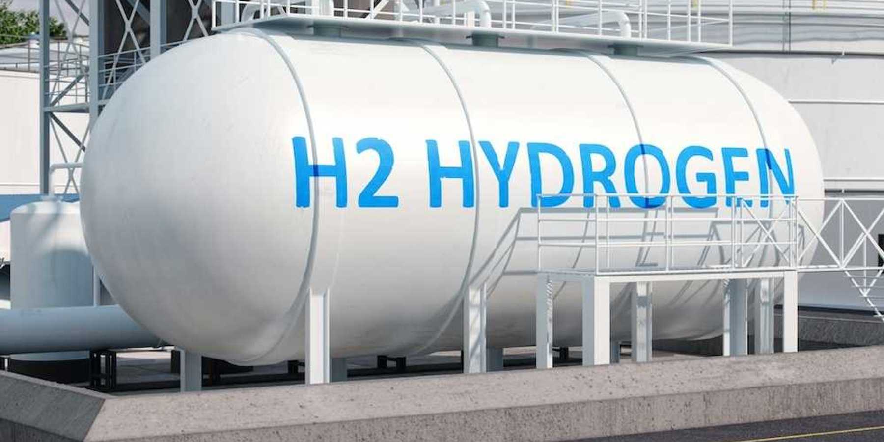 Large white storage tank with blue letters reading, "H2 HYDROGEN"