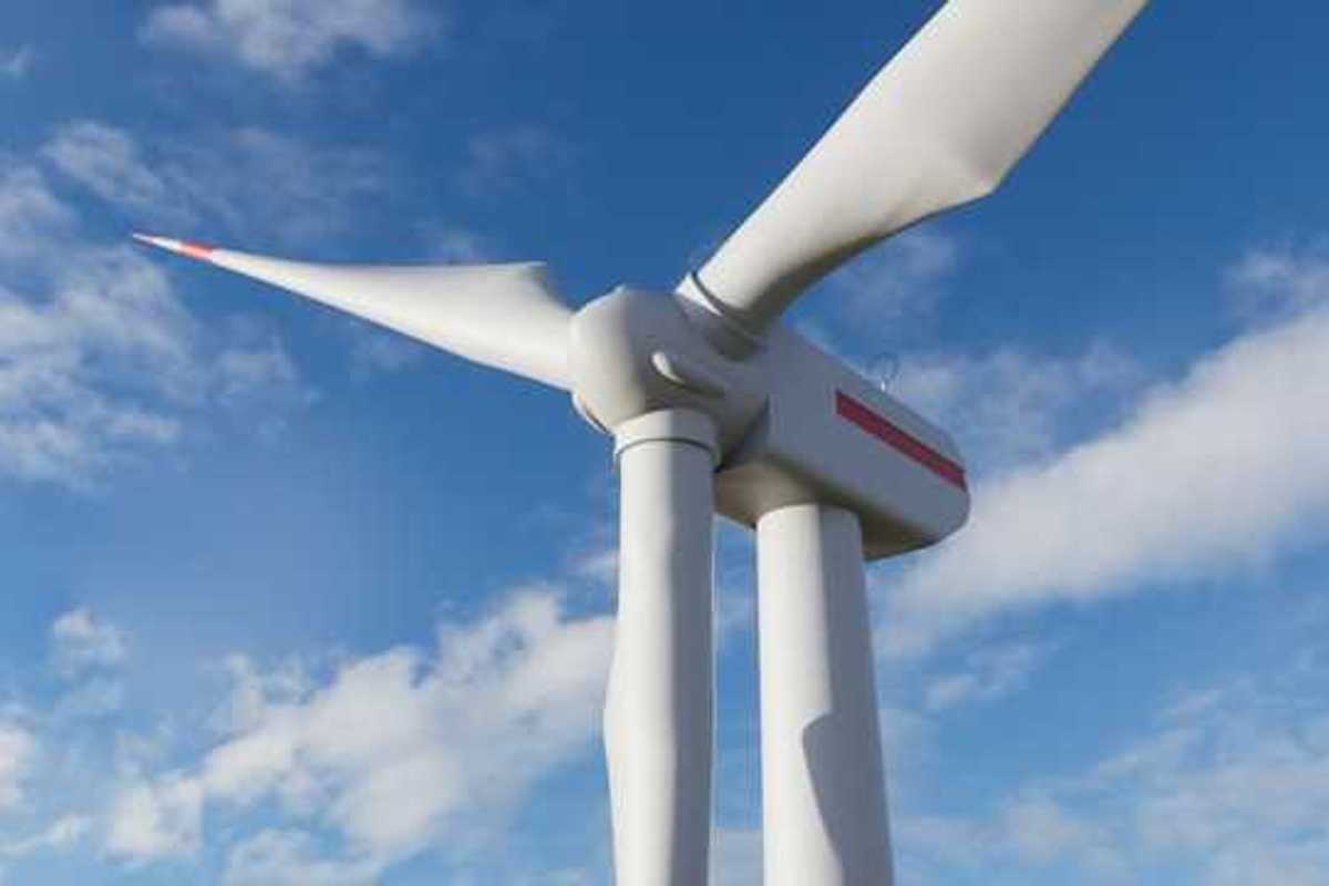 Large white wind turbine on a sunny day