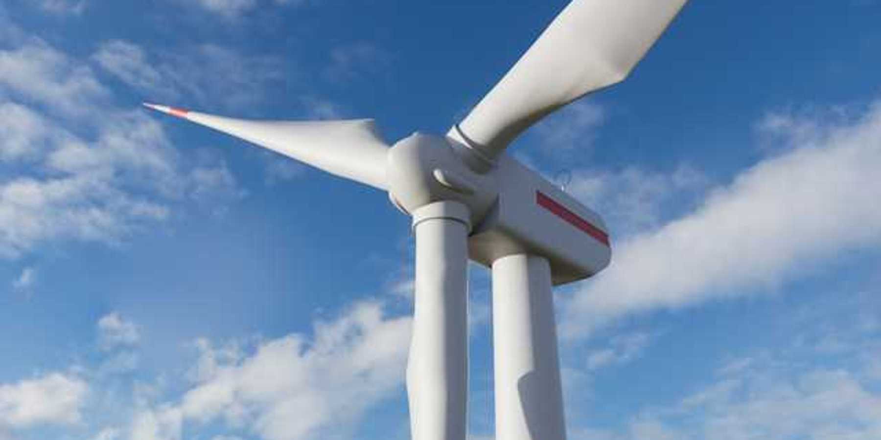 Large white wind turbine on a sunny day