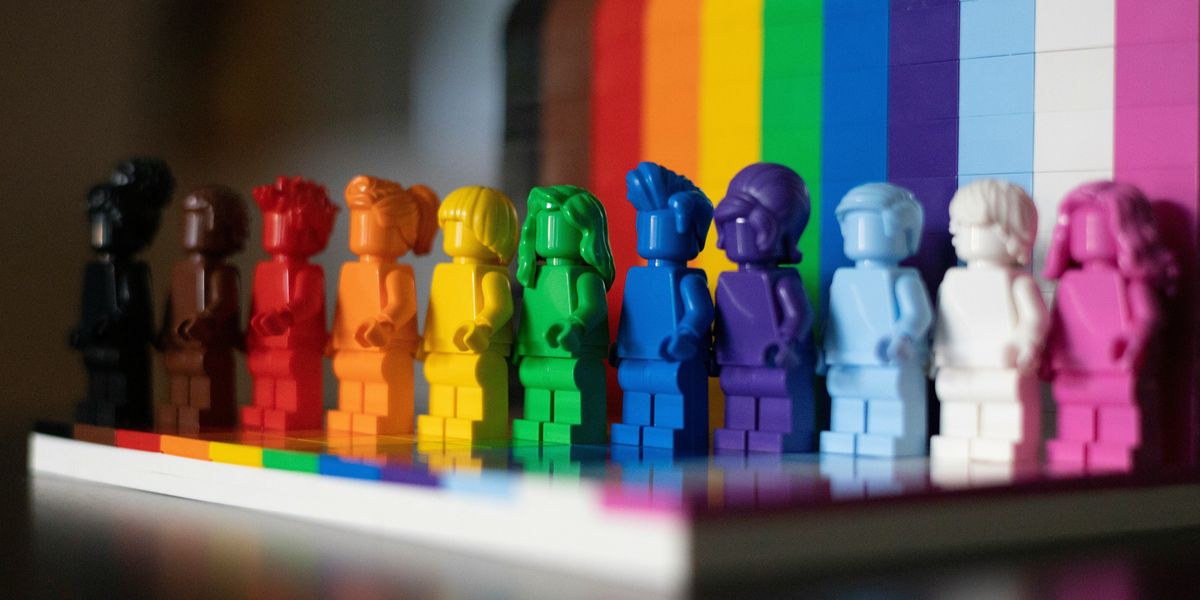 Lego people in the colors of the rainbow.
