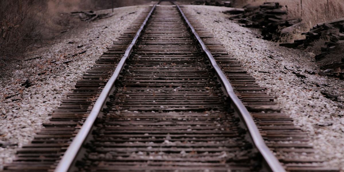 low-angle photo of train rail.