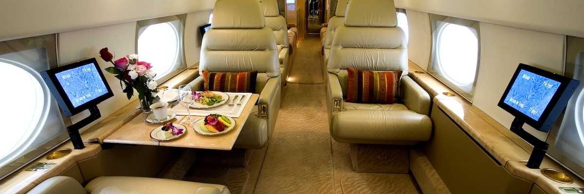 Luxury interior of a private gulfstream jet with large cabin aircraft