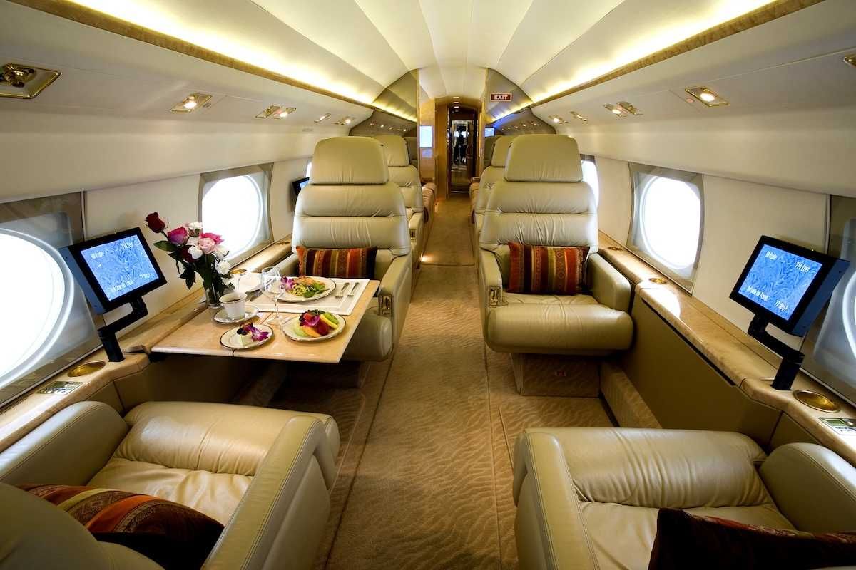 Luxury interior of a private gulfstream jet with large cabin aircraft