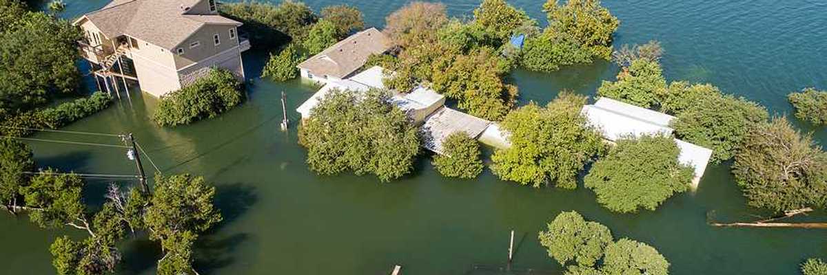 Mansions and luxury homes flooded next to a body of water
