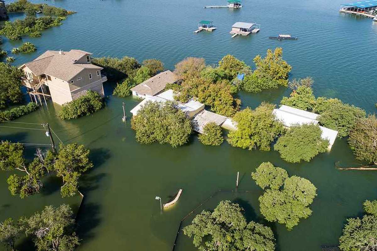 Mansions and luxury homes flooded next to a body of water