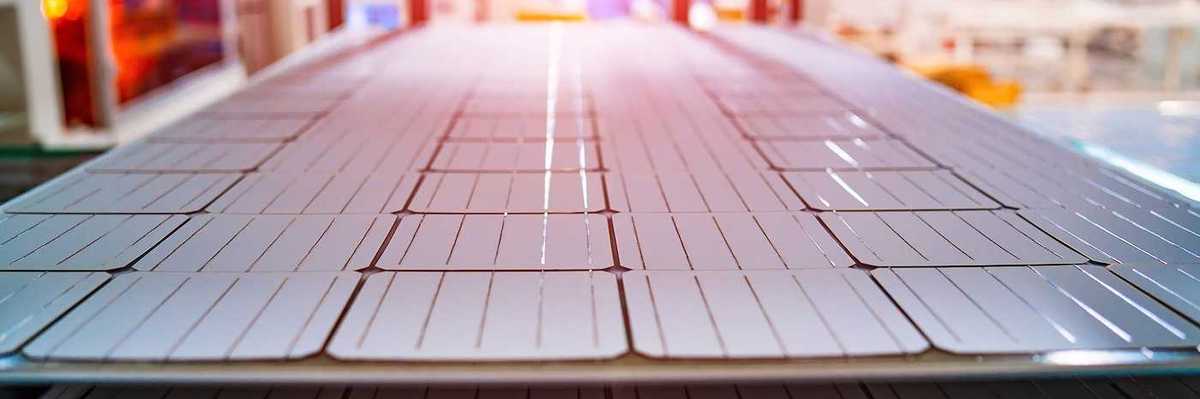 Manufacturing of solar panel system in factory.