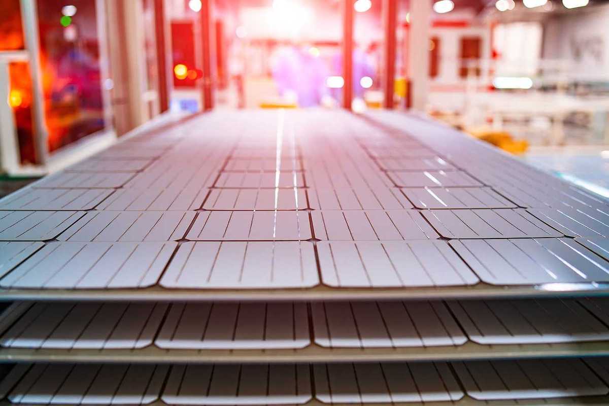 Manufacturing of solar panel system in factory.