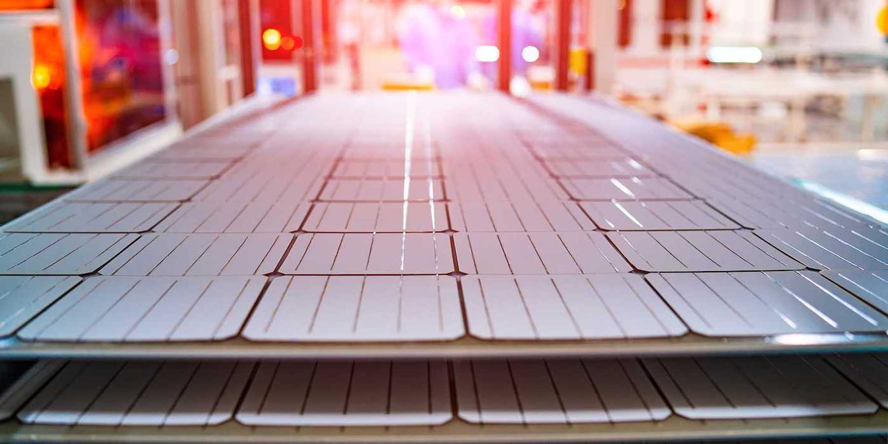 Manufacturing of solar panel system in factory.