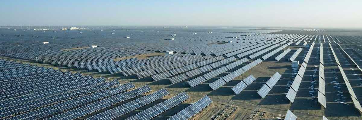 Massive expanse of solar panels stretching to the horizon