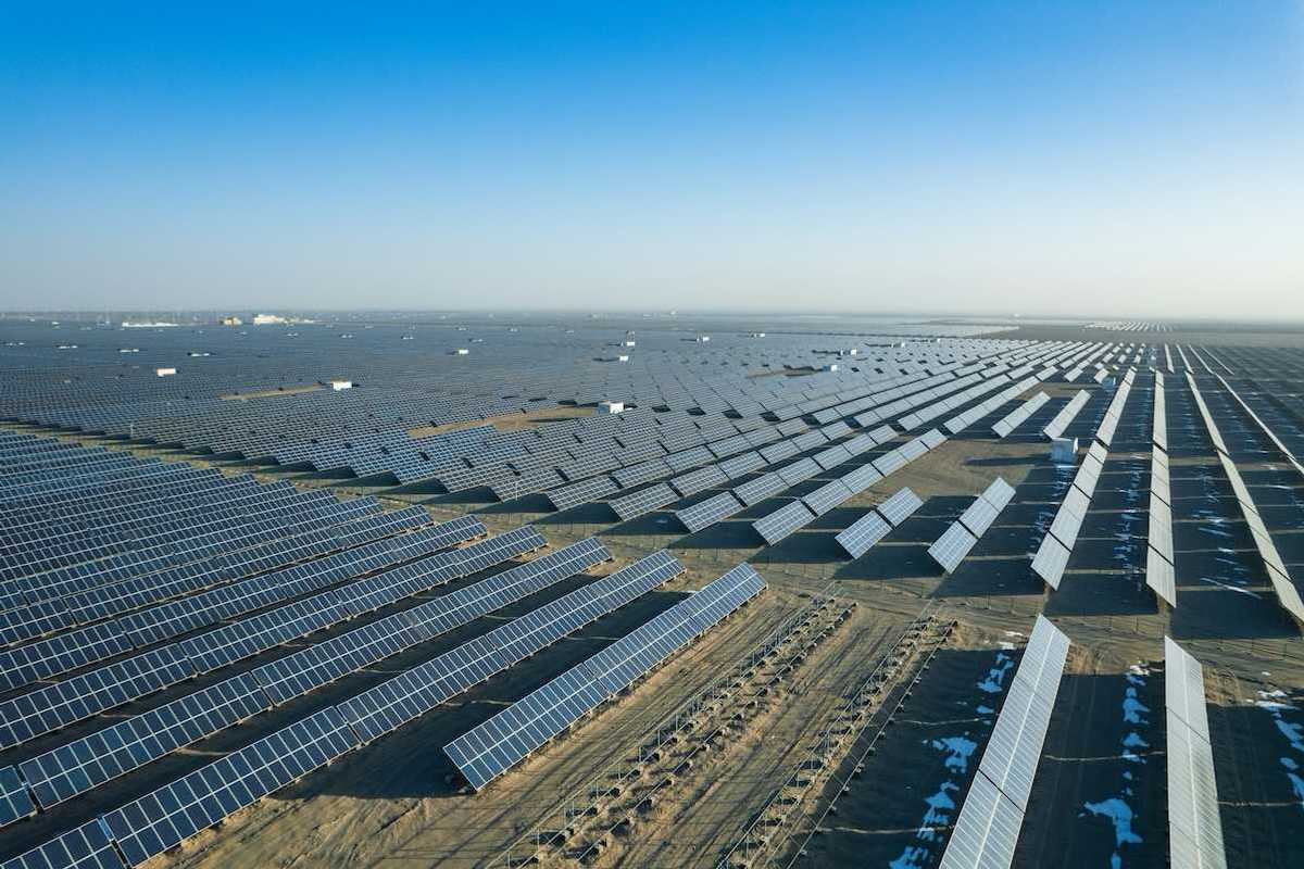 Massive expanse of solar panels stretching to the horizon