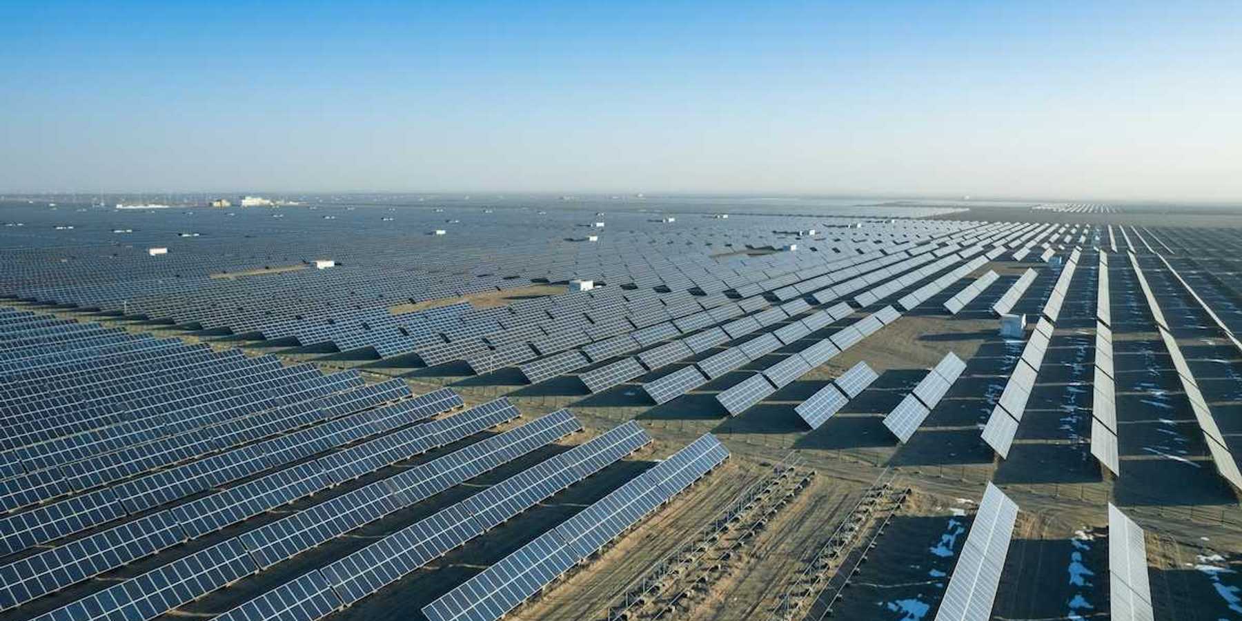 Massive expanse of solar panels stretching to the horizon