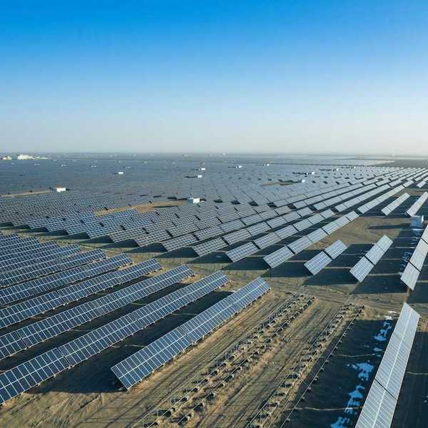 Massive expanse of solar panels stretching to the horizon