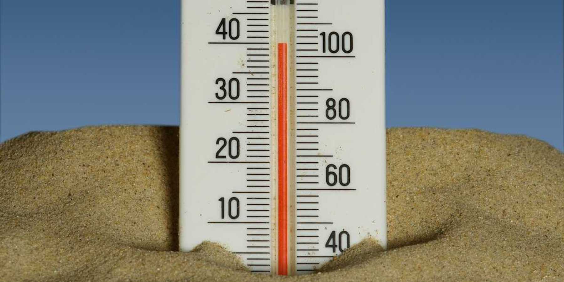 Mercury thermometer stuck in the sand and reading 40 degrees C/104 degrees F