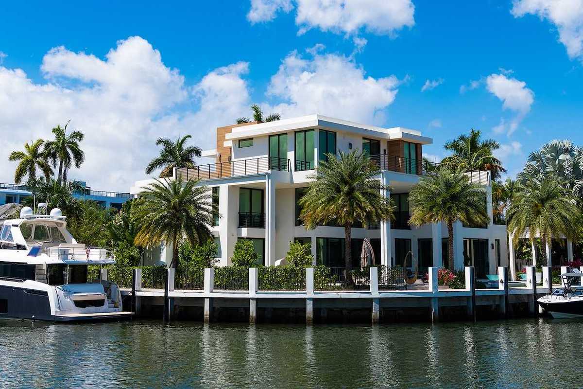 Modern luxury villa with private yacht