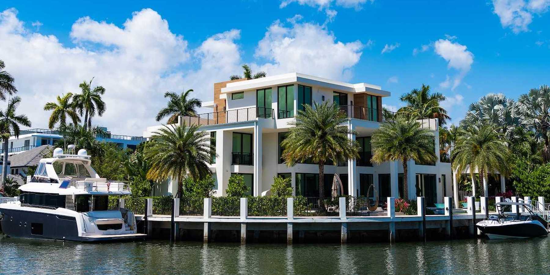 Modern luxury villa with private yacht