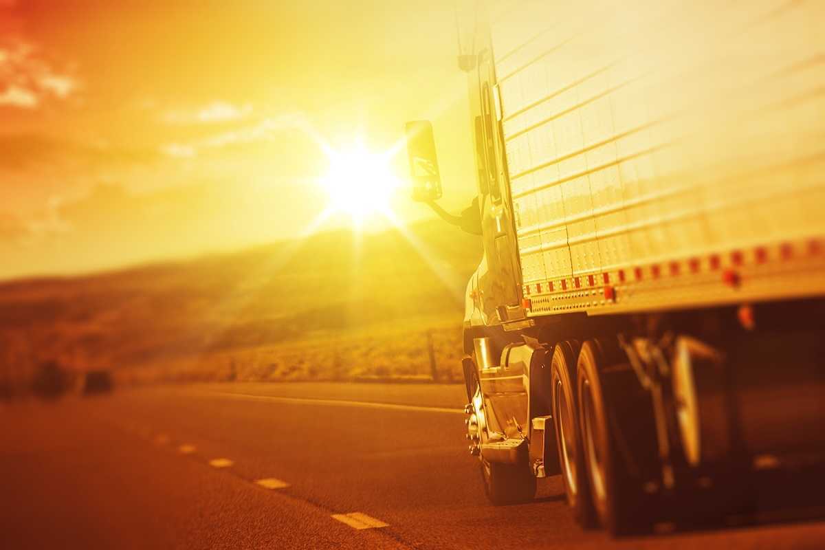 Modern semi truck in motion on an American highway