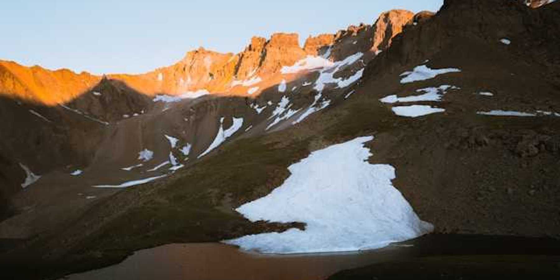 Mountains in the sun with a small amount of snow