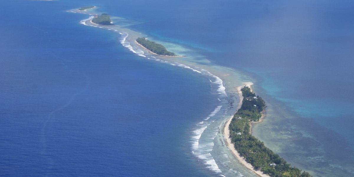 narrow island jutting out into water