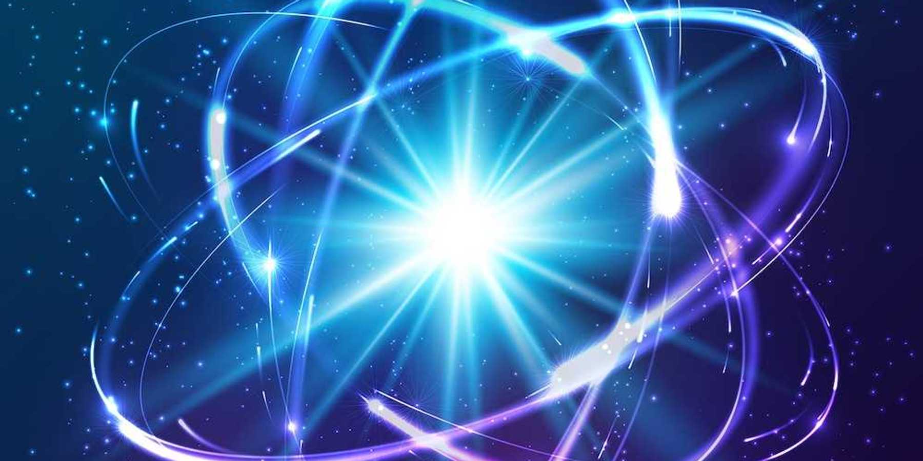 Neon lights depicting a cosmic atom model representing nuclear fusion