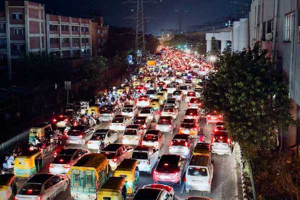 Nightime rush hour traffic jam in Delhi, India