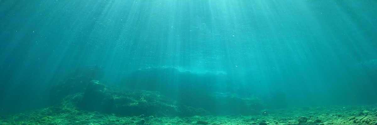 Ocean floor with light filtering through