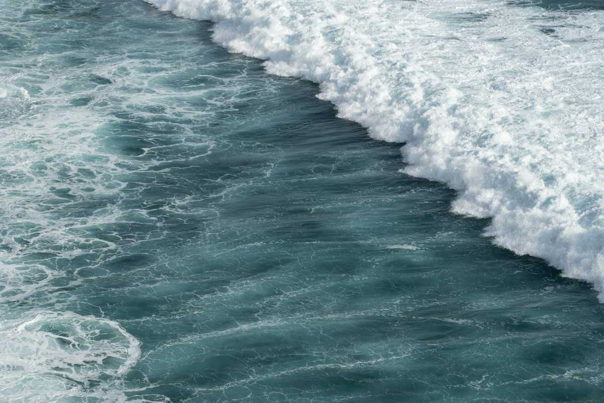 Ocean surf at the beachline