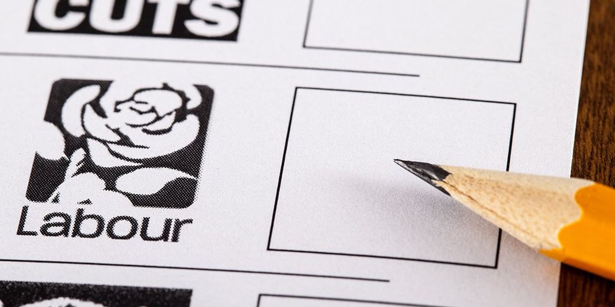 pencil hovering over empty box next to Labour