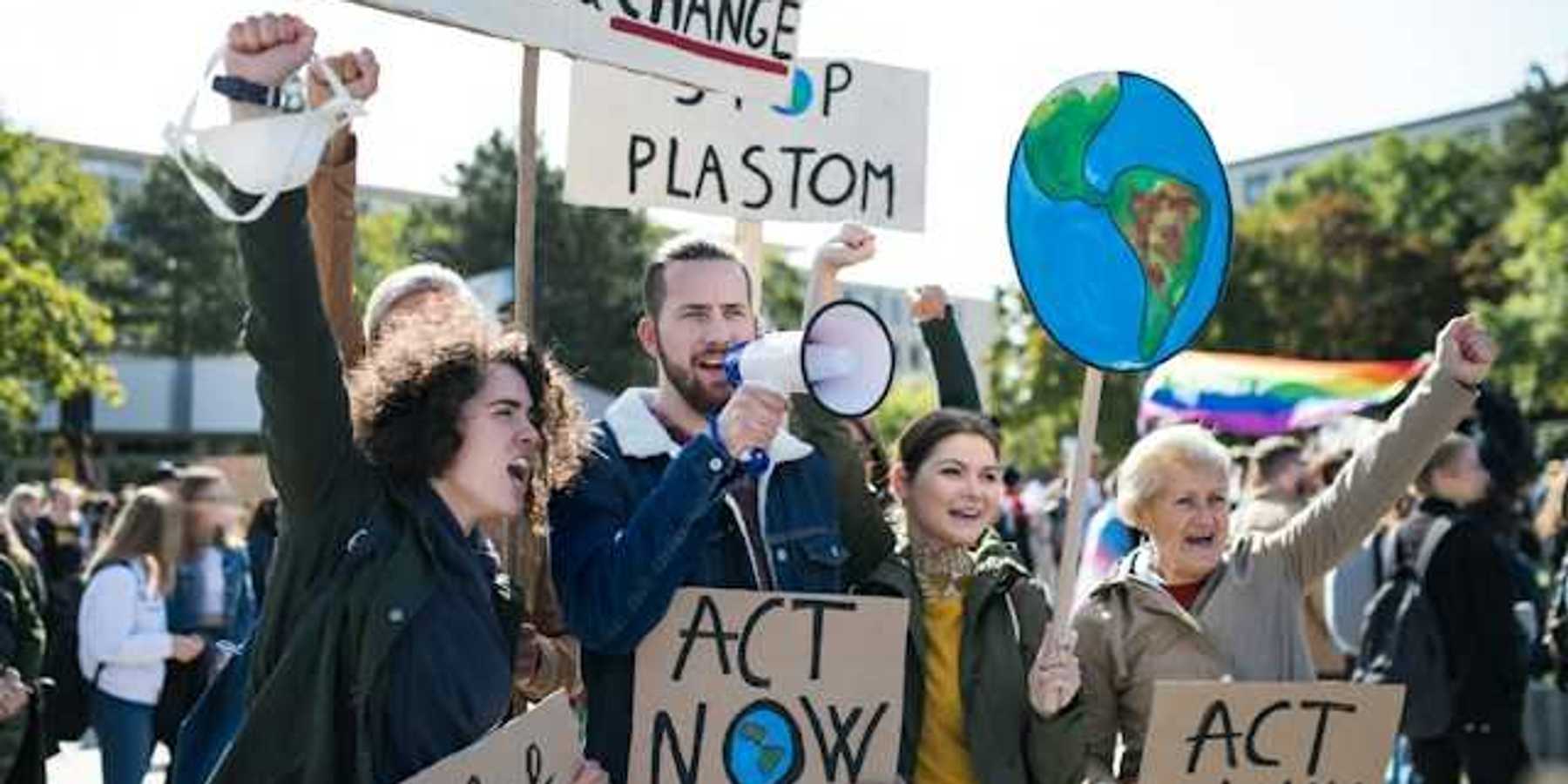 People with signs at a climate protest