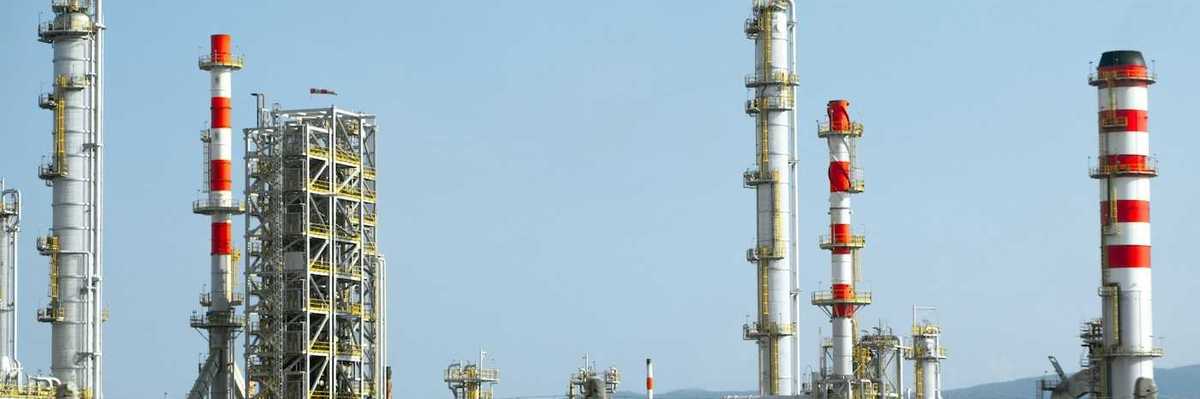 Petrochemical facility with multiple emissions stacks.