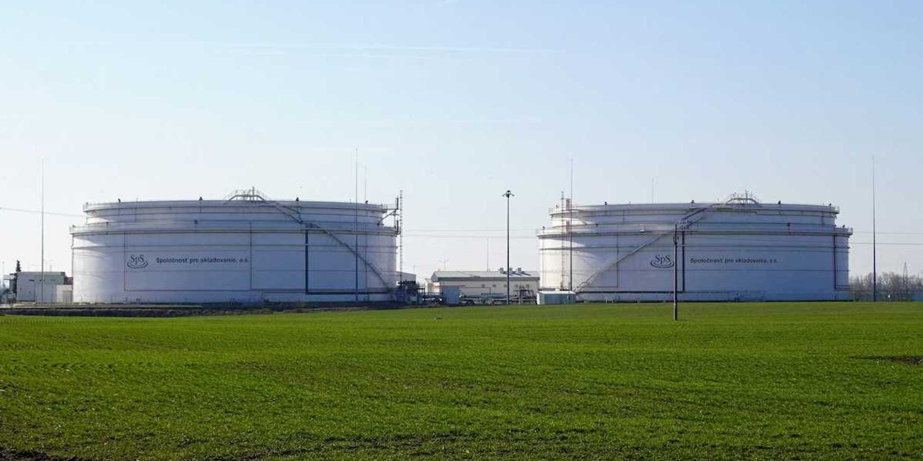 Petroleum storage tanks in a green industrial setting