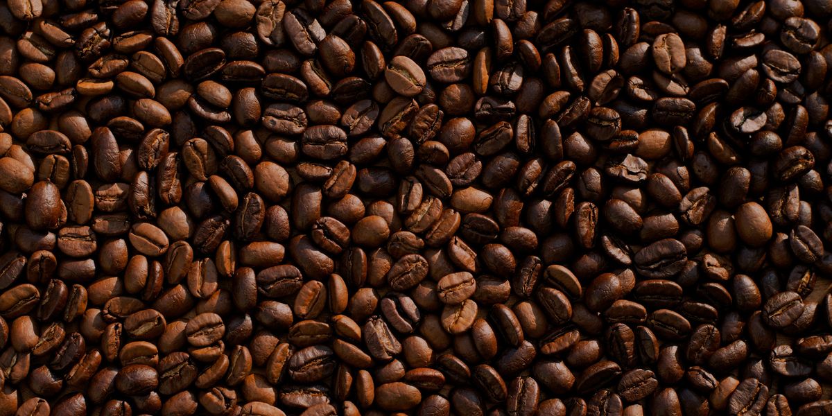 Pile of roasted brown coffee beans.
