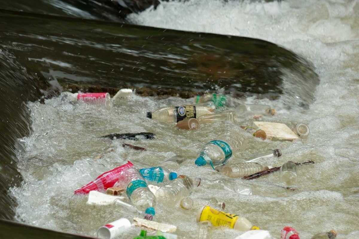plastic trash bobbing in a river