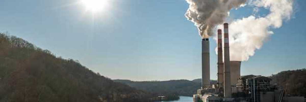 Power plant beside a river and forest