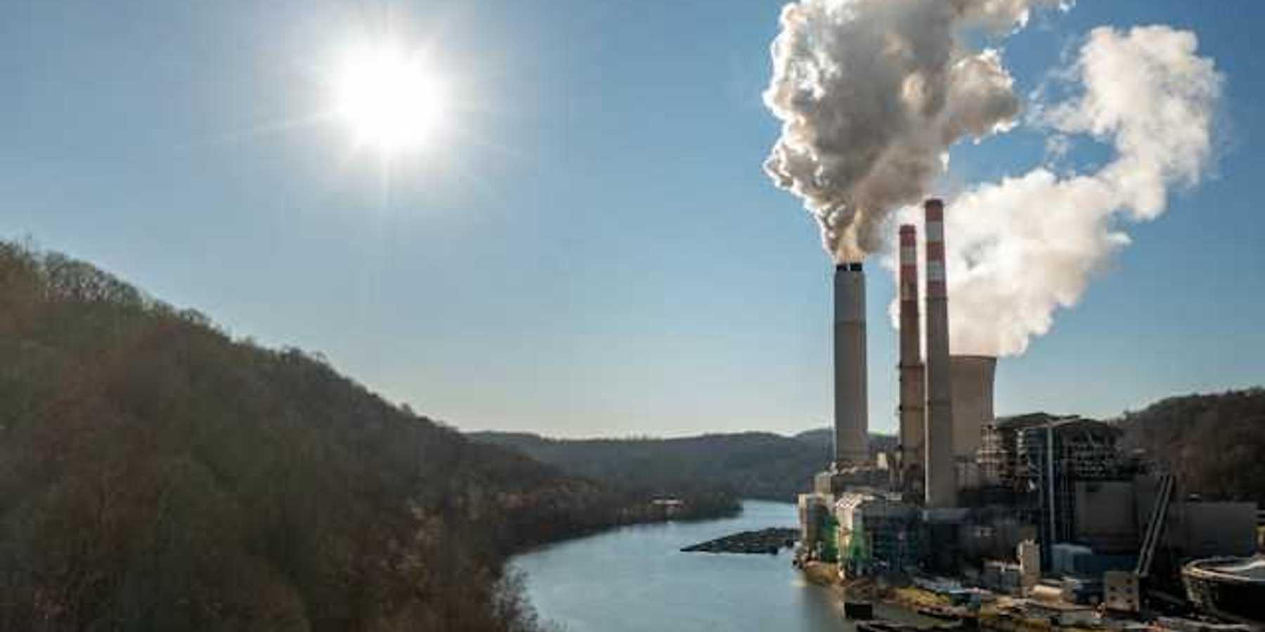 Power plant beside a river and forest